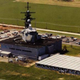 Illustration for article titled Why Is There a US Naval Cruiser in the Middle of This Cornfield?